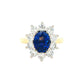 Oval Sapphire and round brilliant cut diamond cluster ring