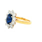 Oval Sapphire and round brilliant cut diamond cluster ring
