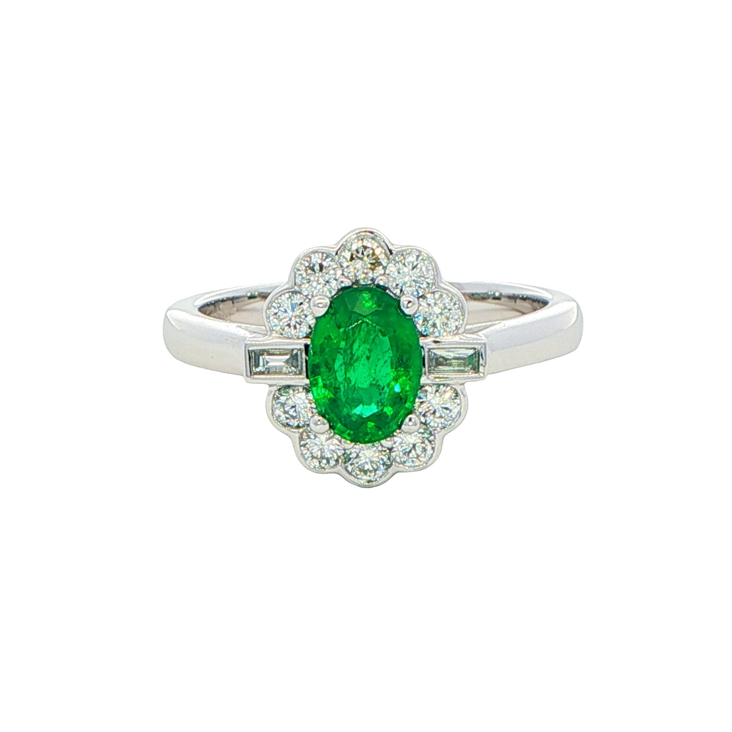 Oval emerald and diamond fancy cluster style ring Gardiner Brothers