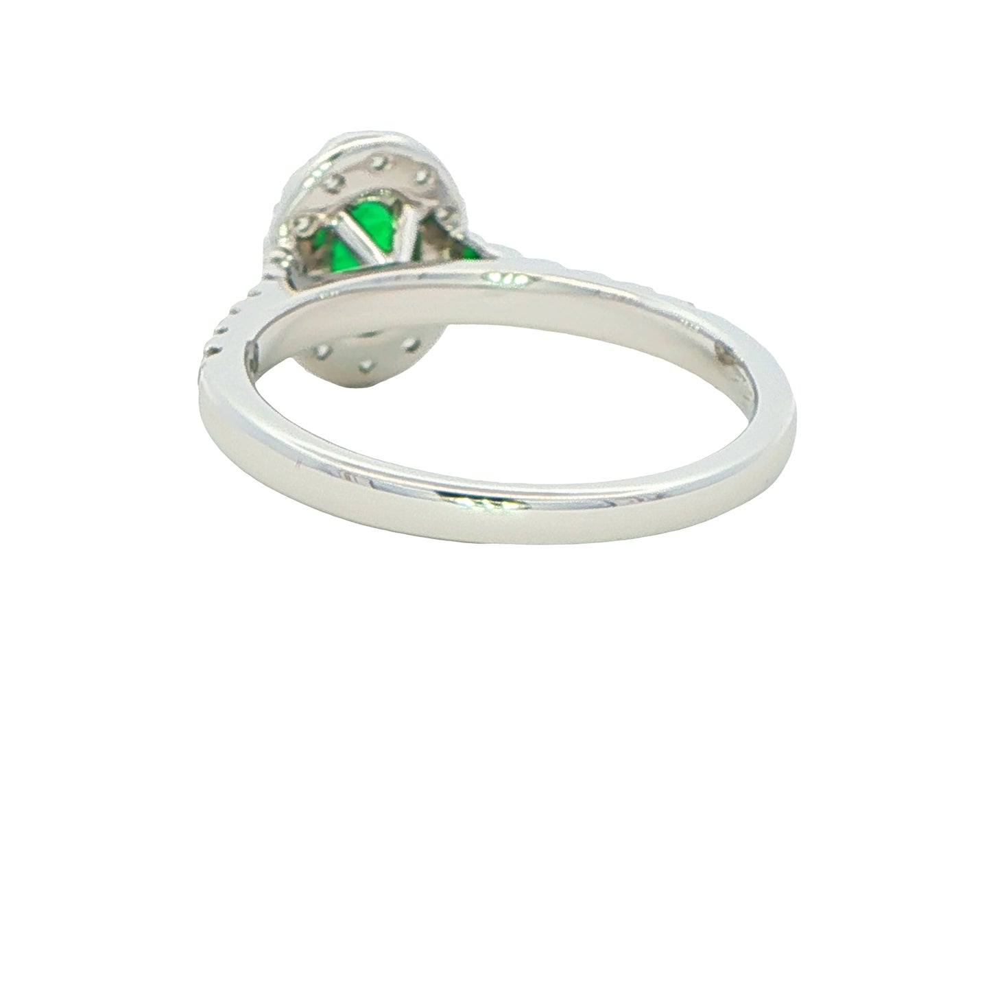 Emerald and round Brilliant Cut diamond halo style ring Gardiner Brothers