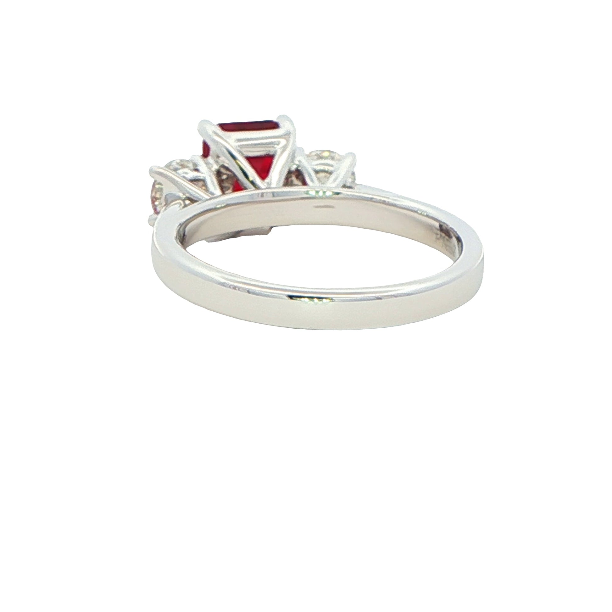 Octagonal shaped ruby with round brilliant cut diamond 3 stone ring Gardiner Brothers