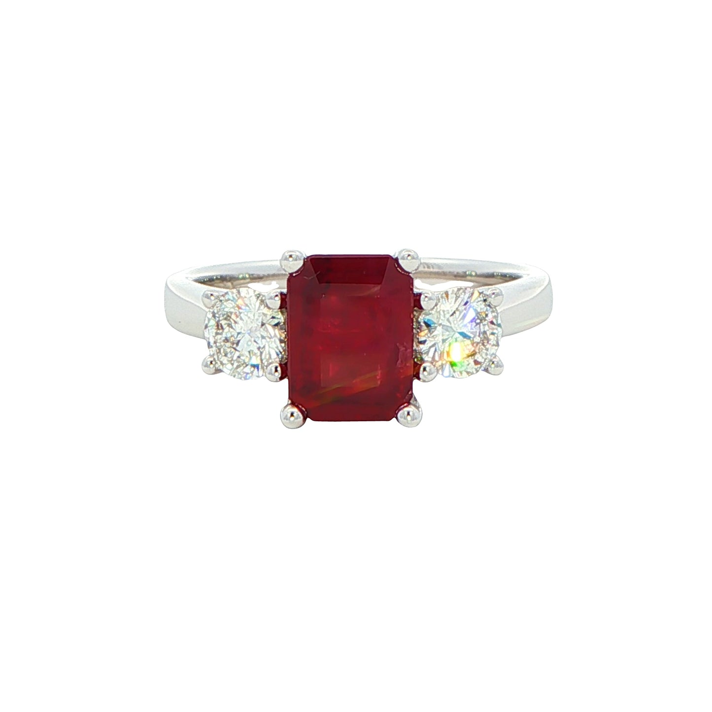 Octagonal shaped ruby with round brilliant cut diamond 3 stone ring Gardiner Brothers