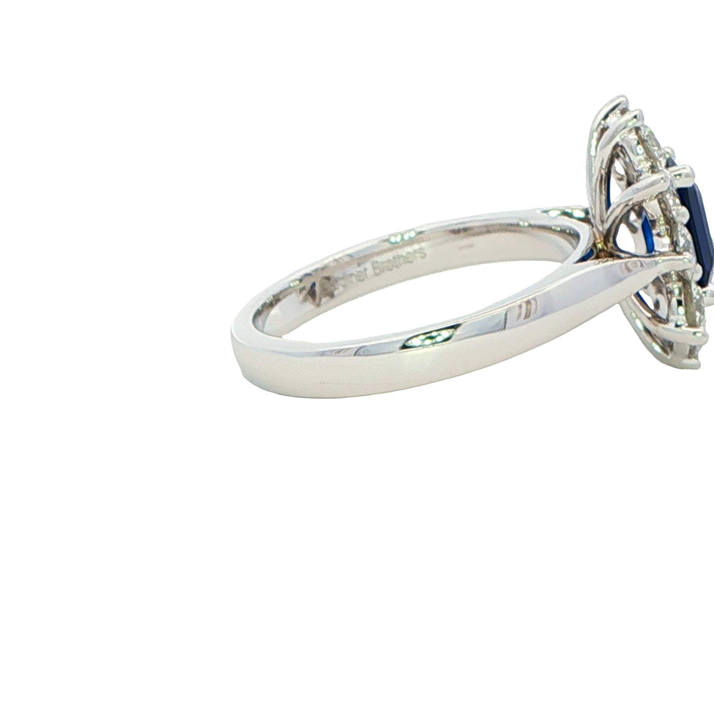 Octagonal Sapphire and round brilliant cut diamond cluster ring Gardiner Brothers