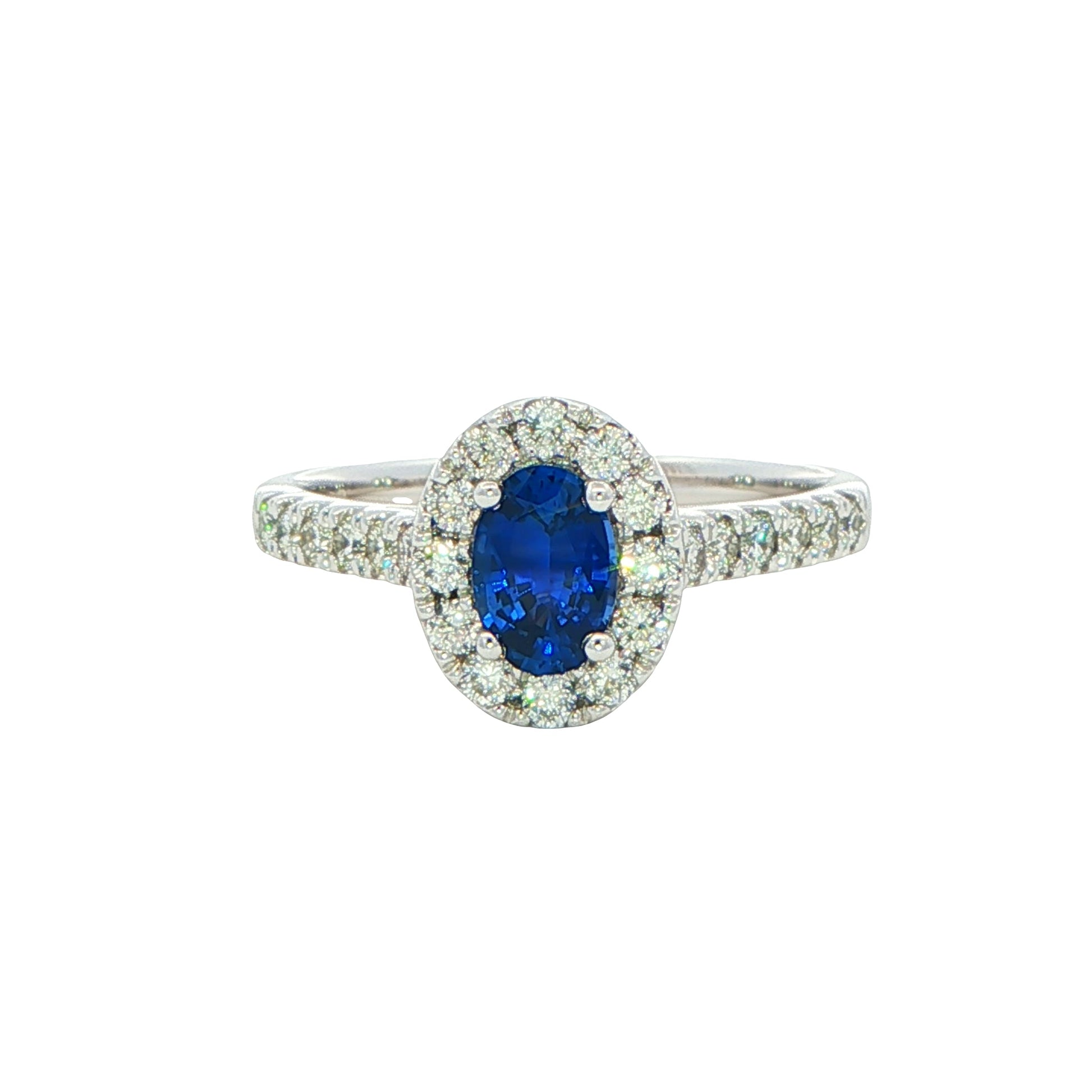 Oval shaped sapphire and round brilliant cut diamond halo style ring Gardiner Brothers
