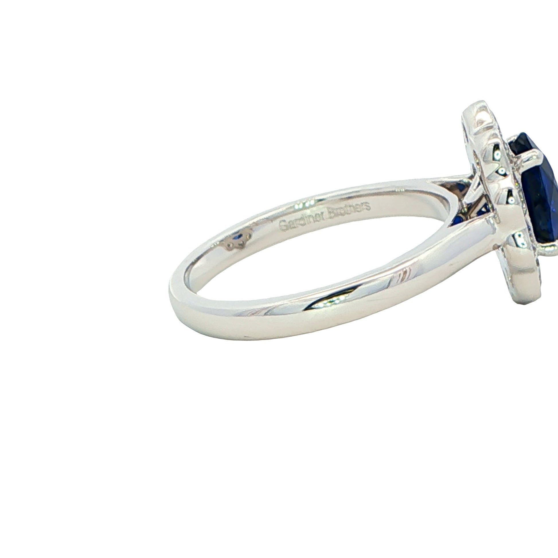 Oval Sapphire and Diamond Modern Cluster Style Ring Gardiner Brothers