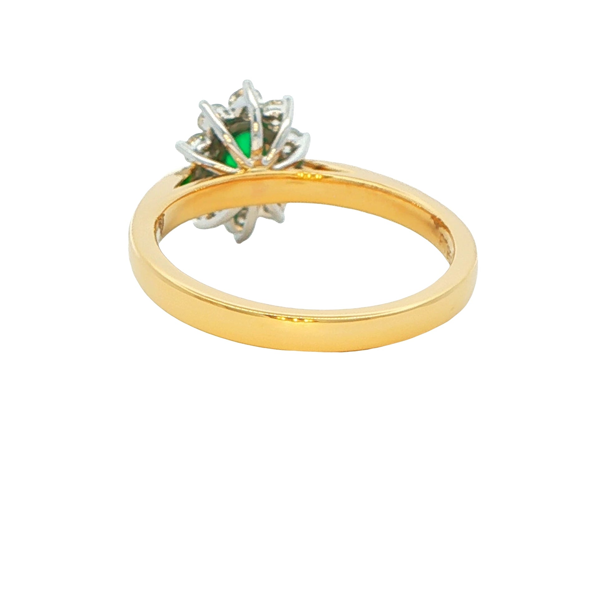 Emerald and round brilliant cut diamond cluster ring Gardiner Brothers