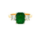 Octagonal emerald and round brilliant cut diamond 3 stone ring Gardiner Brothers