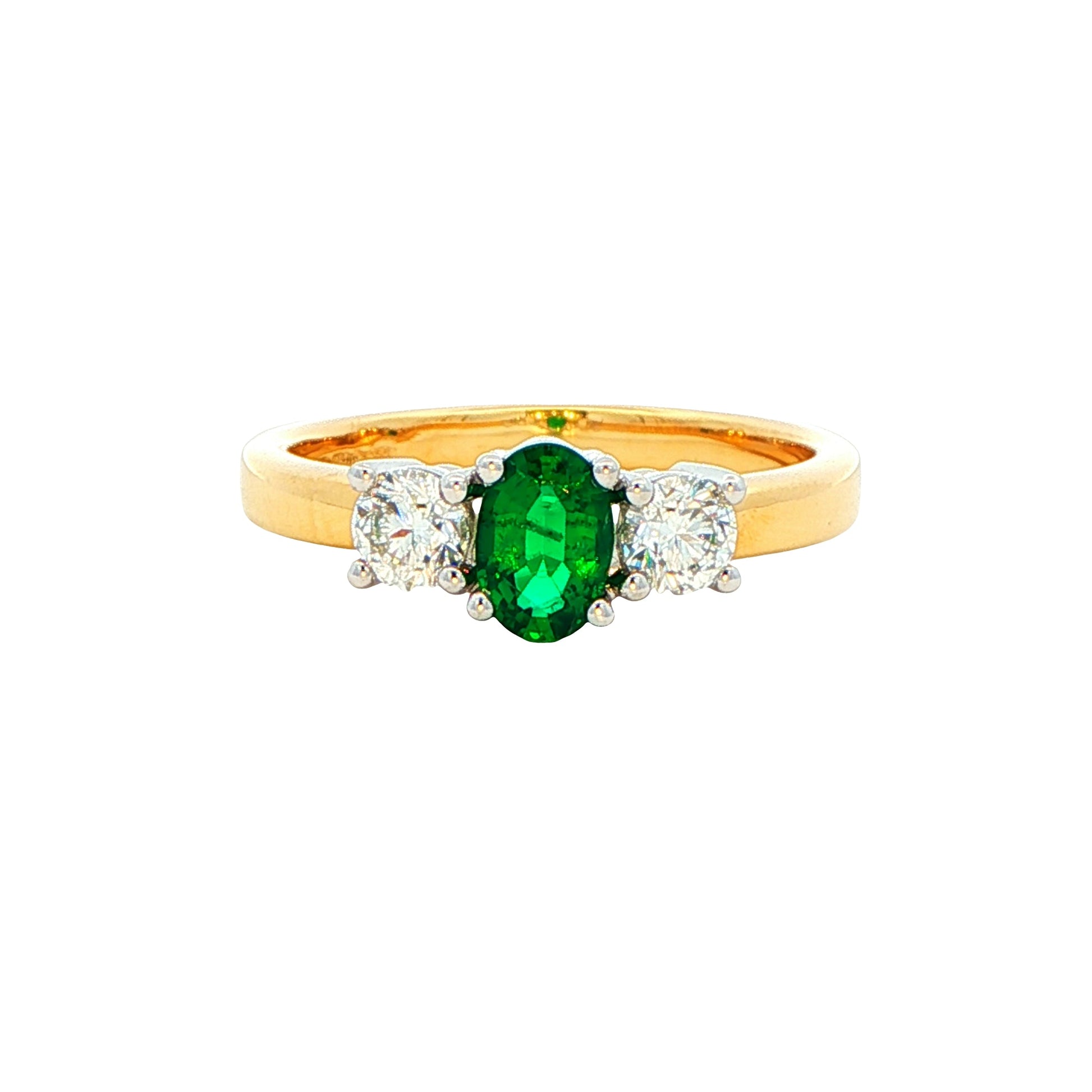 Oval emerald and round brilliant cut diamond 3 stone ring Gardiner Brothers