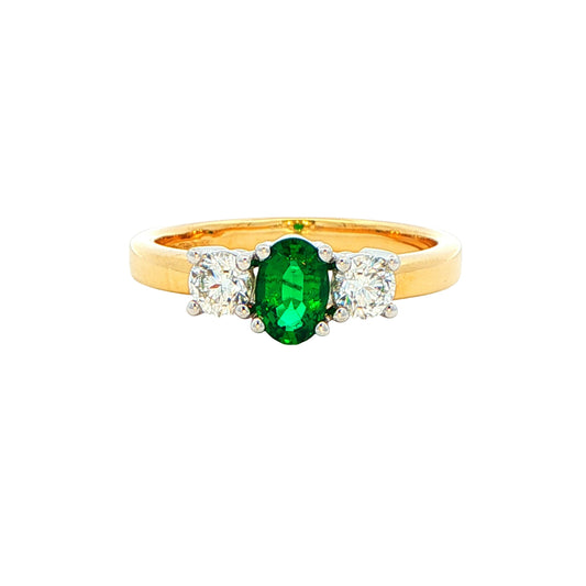 Oval emerald and round brilliant cut diamond 3 stone ring Gardiner Brothers
