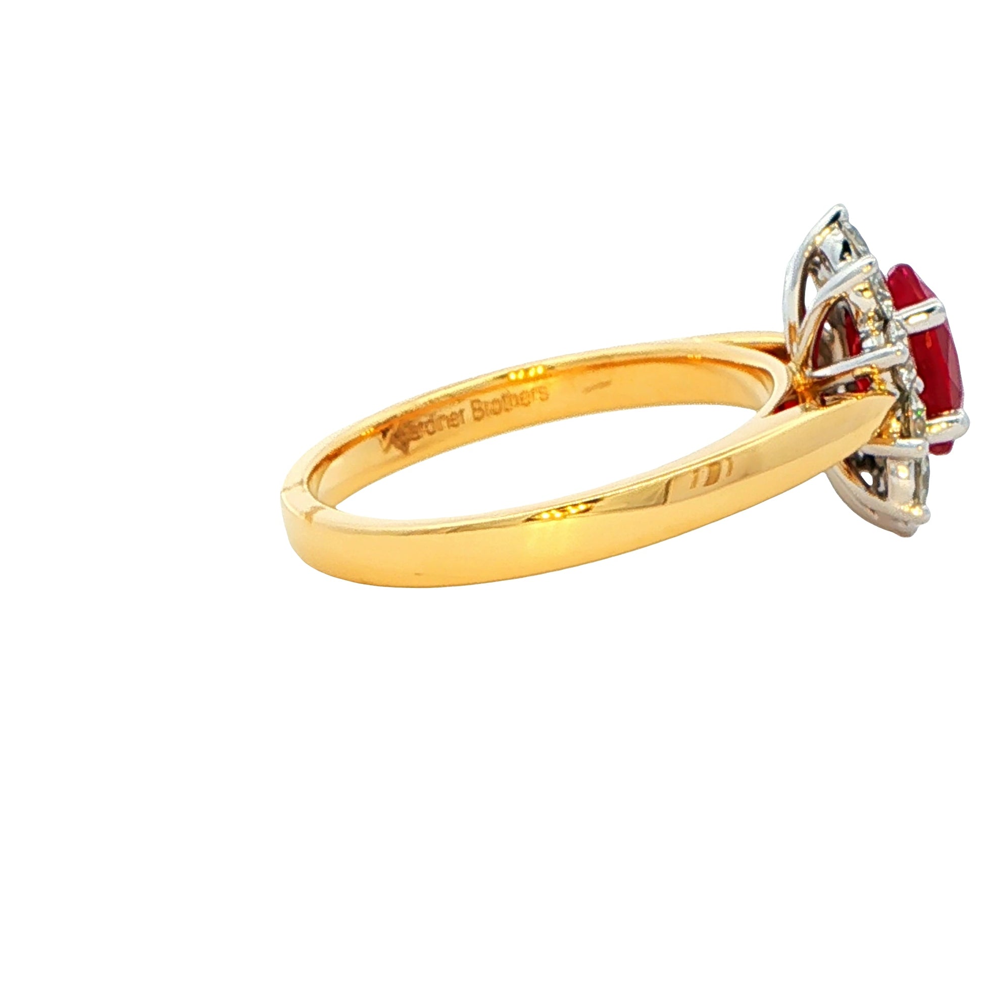 Oval Ruby and round brilliant cut Diamond Cluster Ring gardiner-brothers
