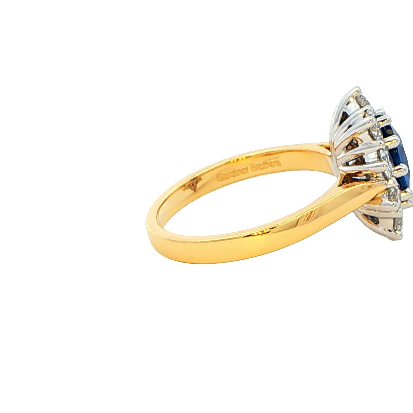 SAPPHIRE AND ROUND BRILLIANT CUT DIAMOND CLUSTER STYLE RING Gardiner Brothers