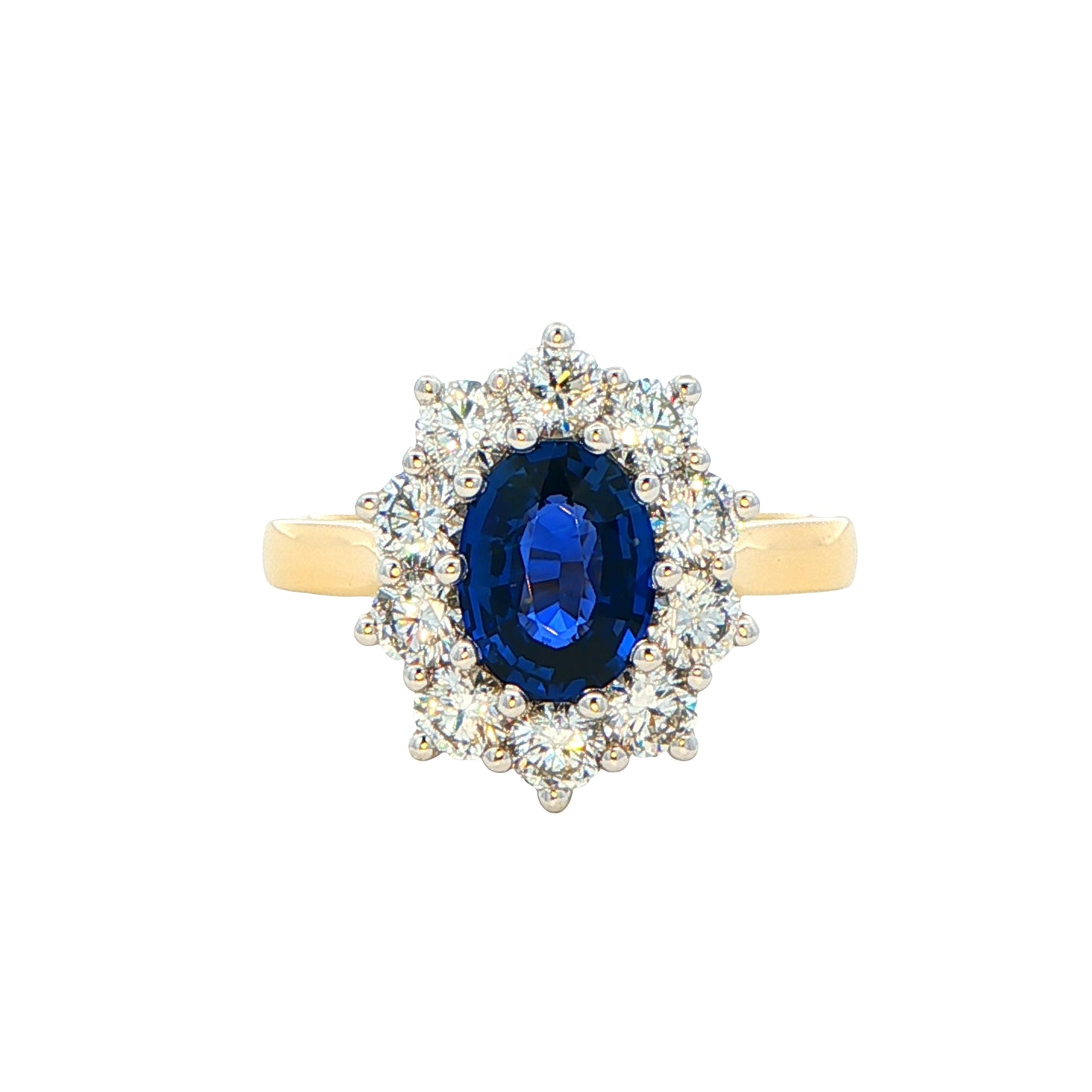 SAPPHIRE AND ROUND BRILLIANT CUT DIAMOND CLUSTER STYLE RING Gardiner Brothers