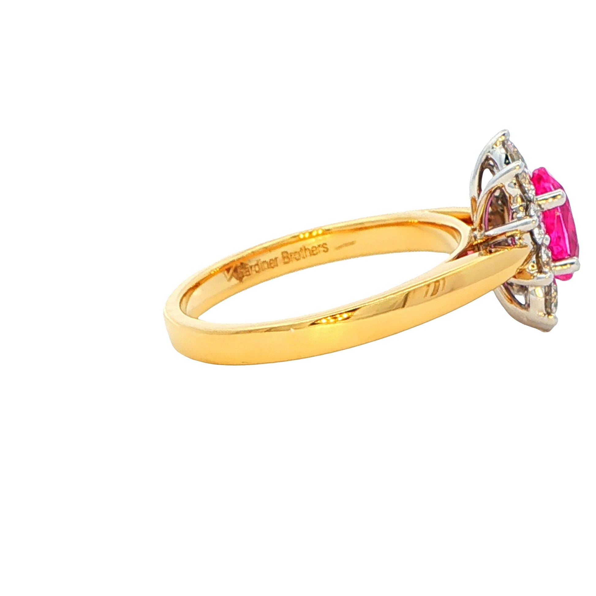 Oval shaped pink sapphire and round brilliant cut diamond cluster ring Gardiner Brothers