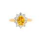 Oval Shaped Yellow Sapphire and round brilliant cut diamond cluster ring Gardiner Brothers