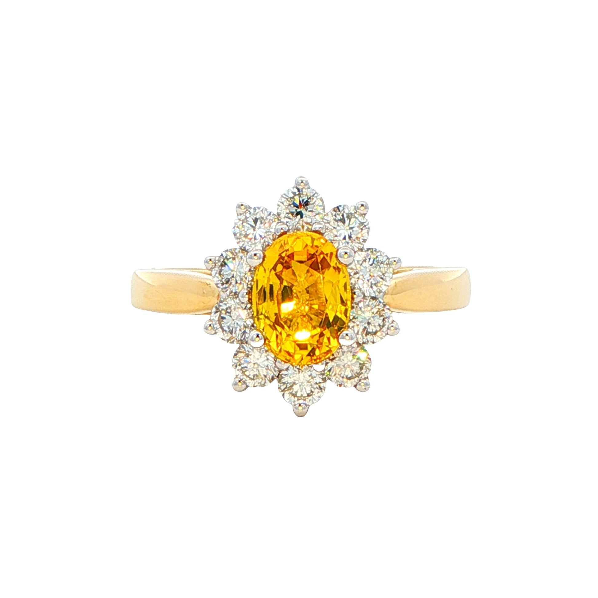 Oval Shaped Yellow Sapphire and round brilliant cut diamond cluster ring Gardiner Brothers