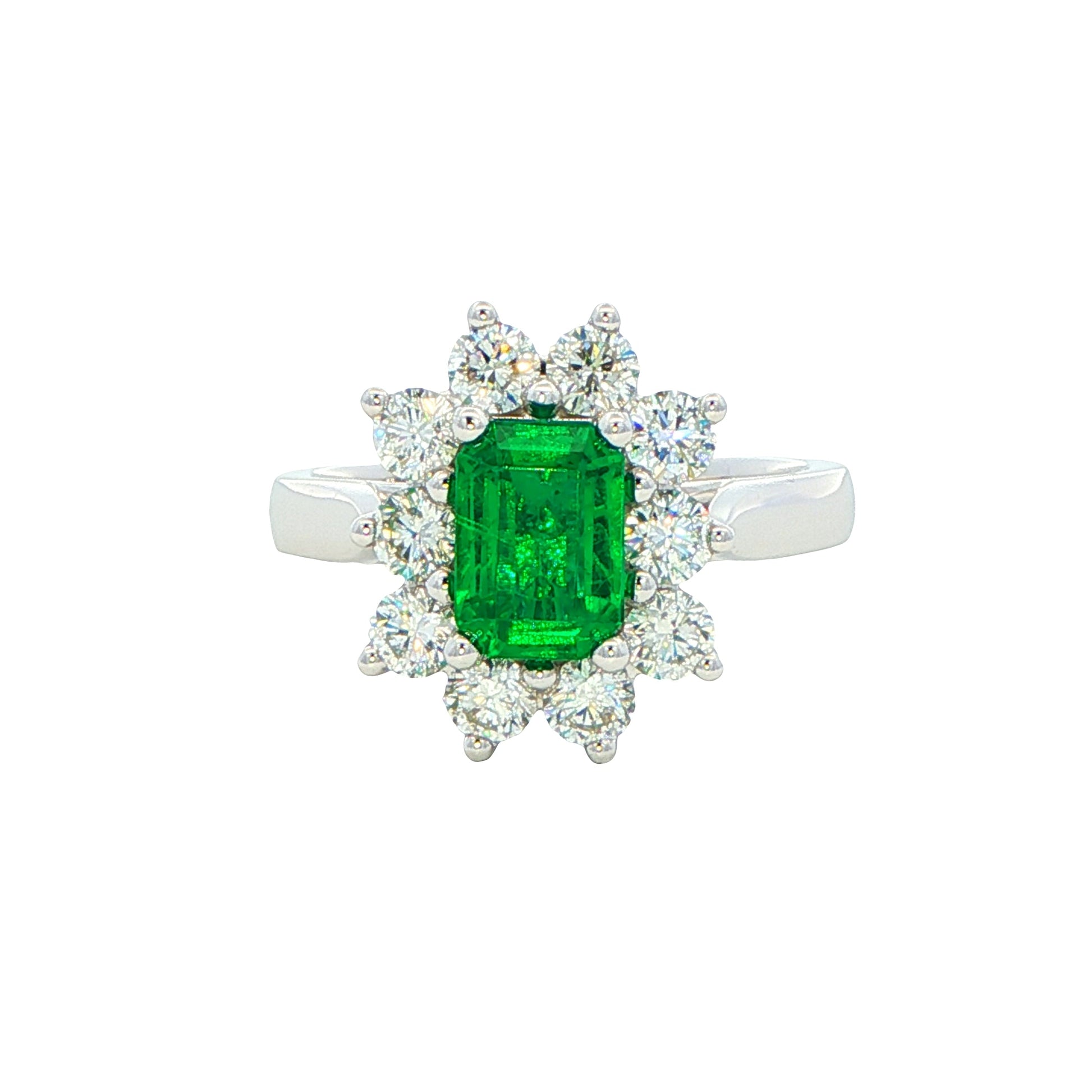 Octagonal shaped emerald and round brilliant cut diamond cluster style ring Gardiner Brothers