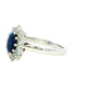 Oval shaped sapphire and round brilliant cut diamond cluster ring Gardiner Brothers