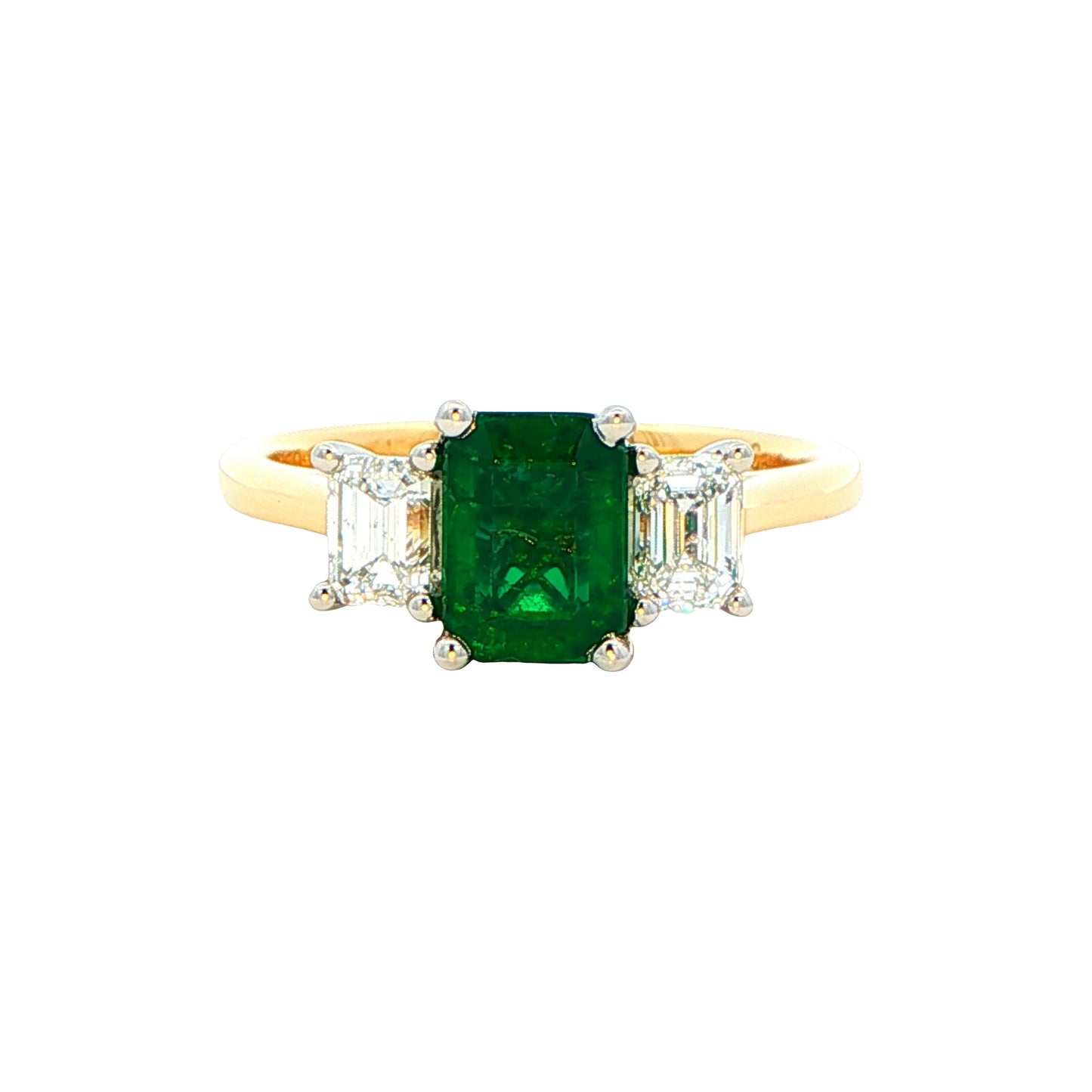 Octagonal shaped emerald and emerald cut diamond 3 stone ring Gardiner Brothers