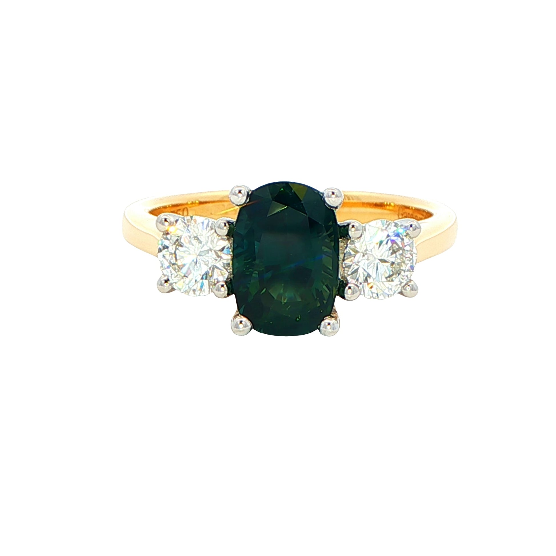 Cushion Shaped Teal Sapphire and round brilliant cut diamond 3 stone ring Gardiner Brothers