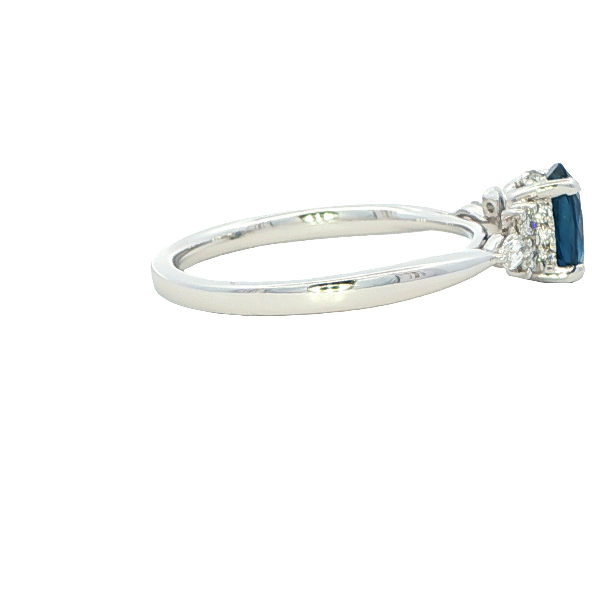 Oval shaped sapphire with brilliant and Marquise diamond set shoudlers Gardiner Brothers