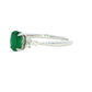 Oval shaped emerald with brilliant and marquise shaped diamond shoulders Gardiner Brothers