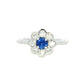 Round sapphire and round brilliant cut diamond cluster style ring Gardiner Brothers