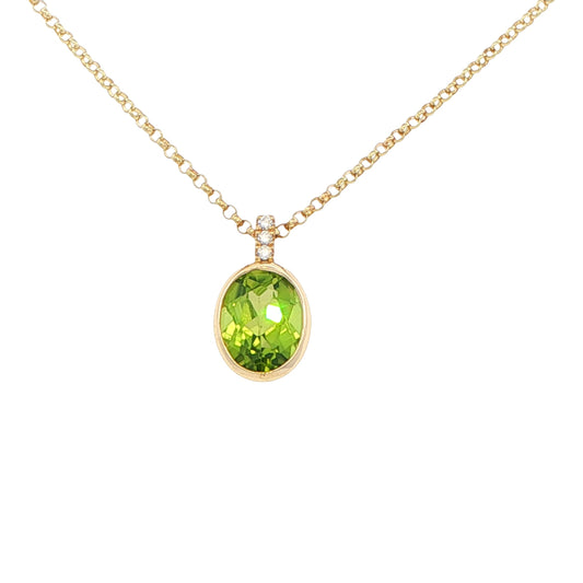 Oval shaped Peridot and round brilliant cut diamond pendant Gardiner Brothers