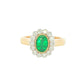 Oval emerald and round brilliant cut diamond vintage style cluster ring