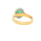 Oval emerald and round brilliant cut diamond vintage style cluster ring