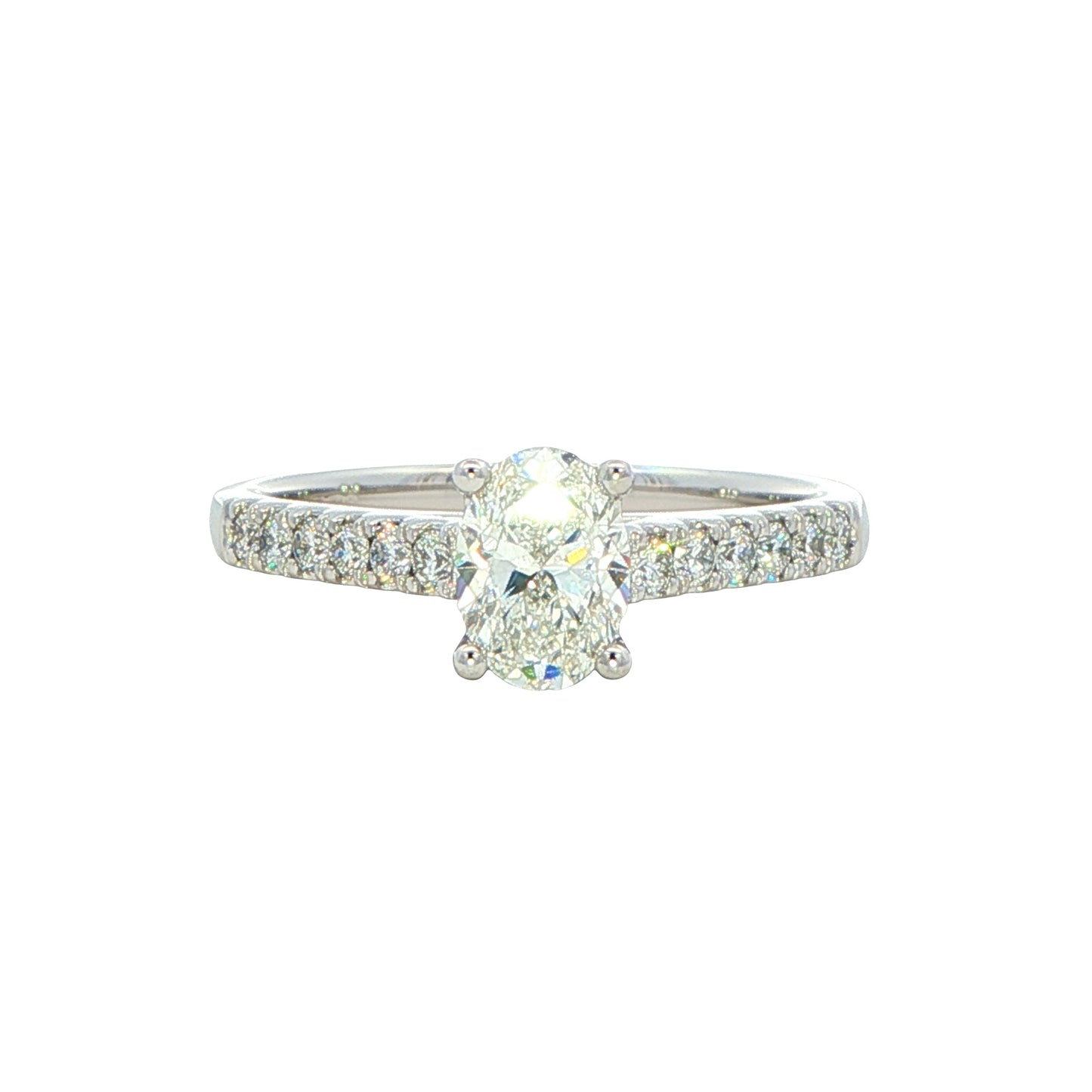 Oval shaped diamond solitaire with round brilliant cut diamond set shoulders - 0.95cts