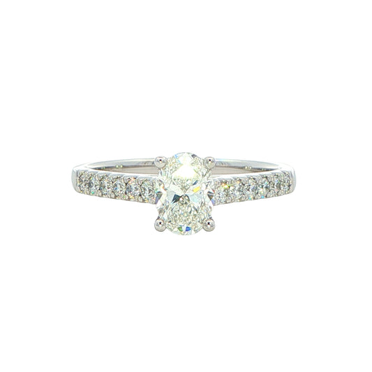 Oval shaped diamond solitaire with round brilliant cut diamond set shoulders - 0.95cts