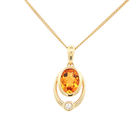 Oval Citrine and round brilliant cut diamond pendant