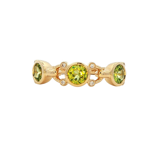 Peridot and round brilliant cut diamond dress ring