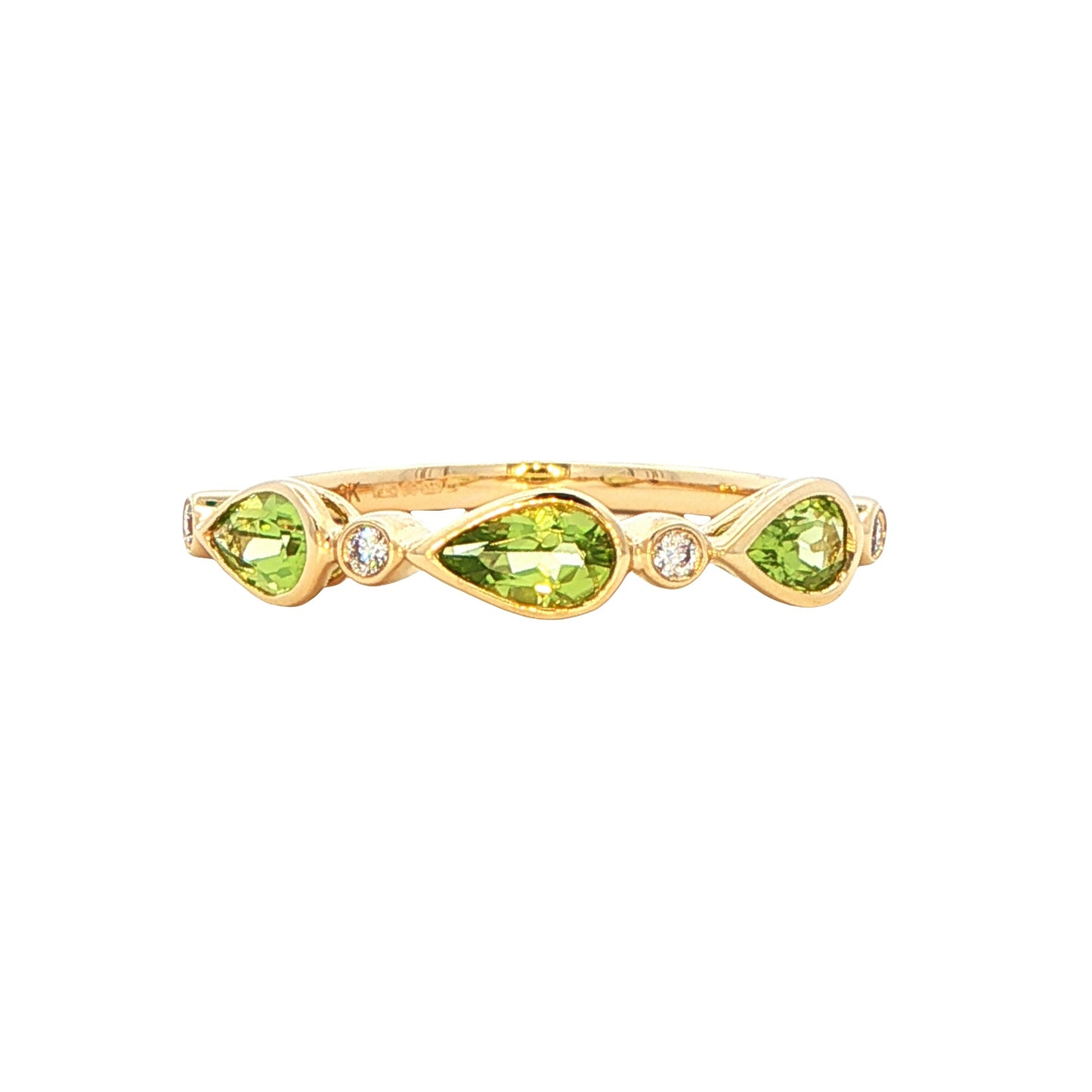 Pear Shaped Peridot and round brilliant cut diamond dress ring
