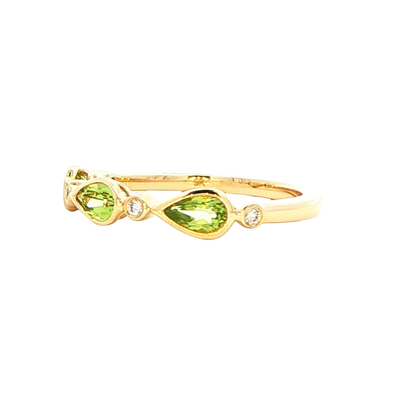 Pear Shaped Peridot and round brilliant cut diamond dress ring