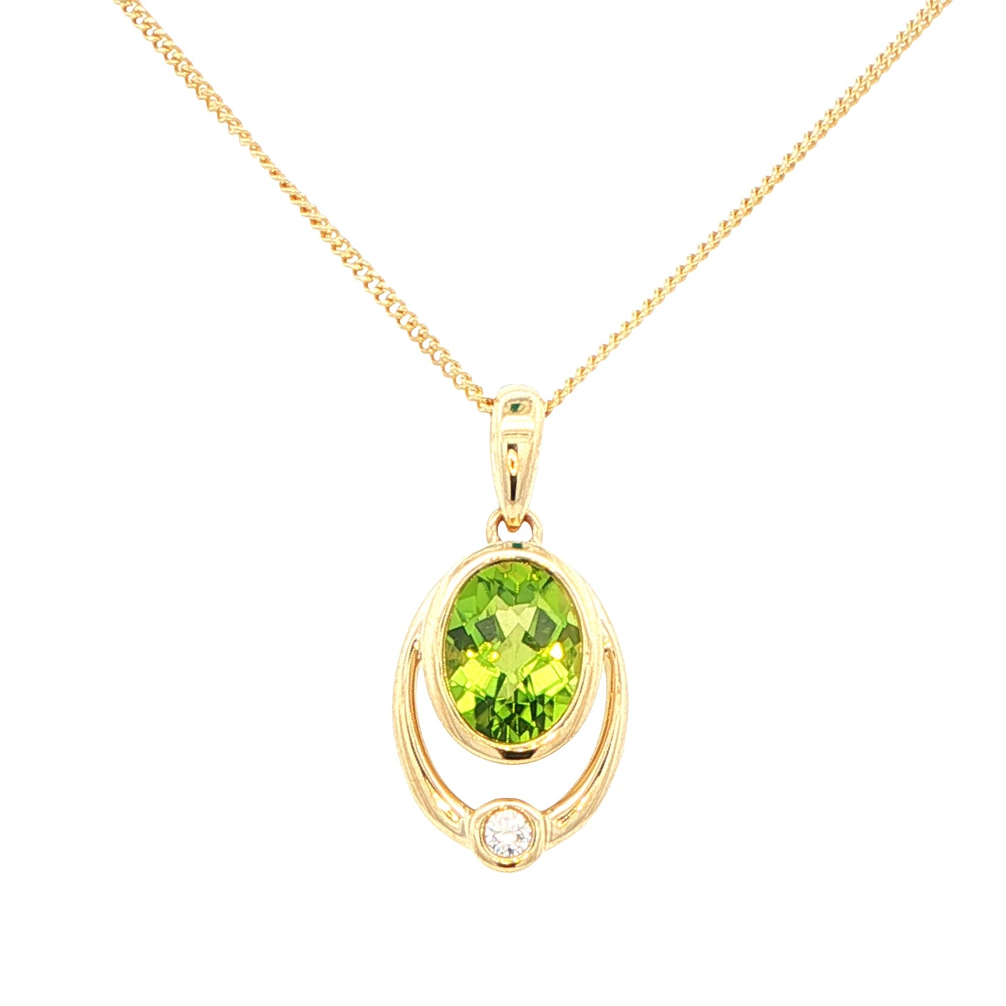 Oval shaped peridot and round brilliant cut diamond pendant