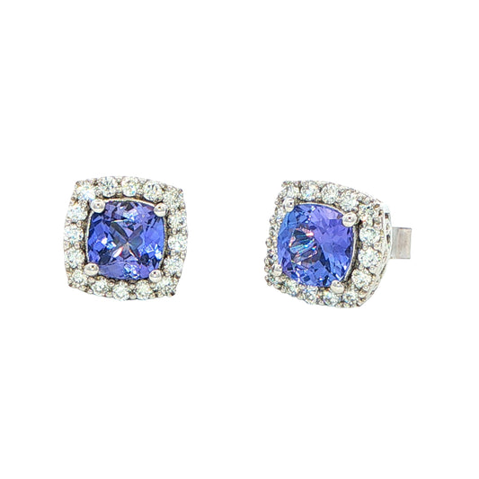 Cushion Shaped Tanzanite and round brilliant cut diamond halo earrings Gardiner Brothers