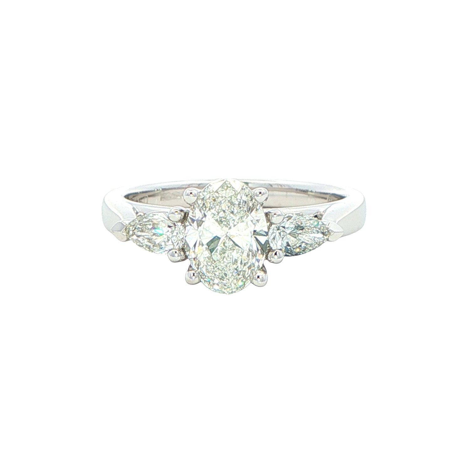 Oval and pear shaped diamond 3 stone ring - 1.30cts