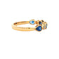 Pear shaped sapphire and round brilliant cut diamond ring