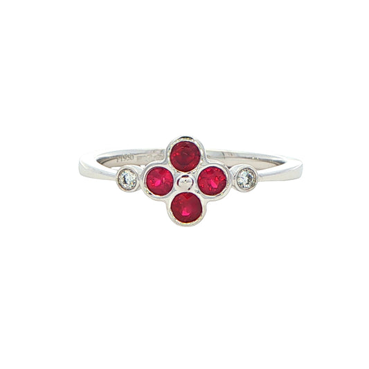 Ruby and round brilliant cut diamond flower style ring