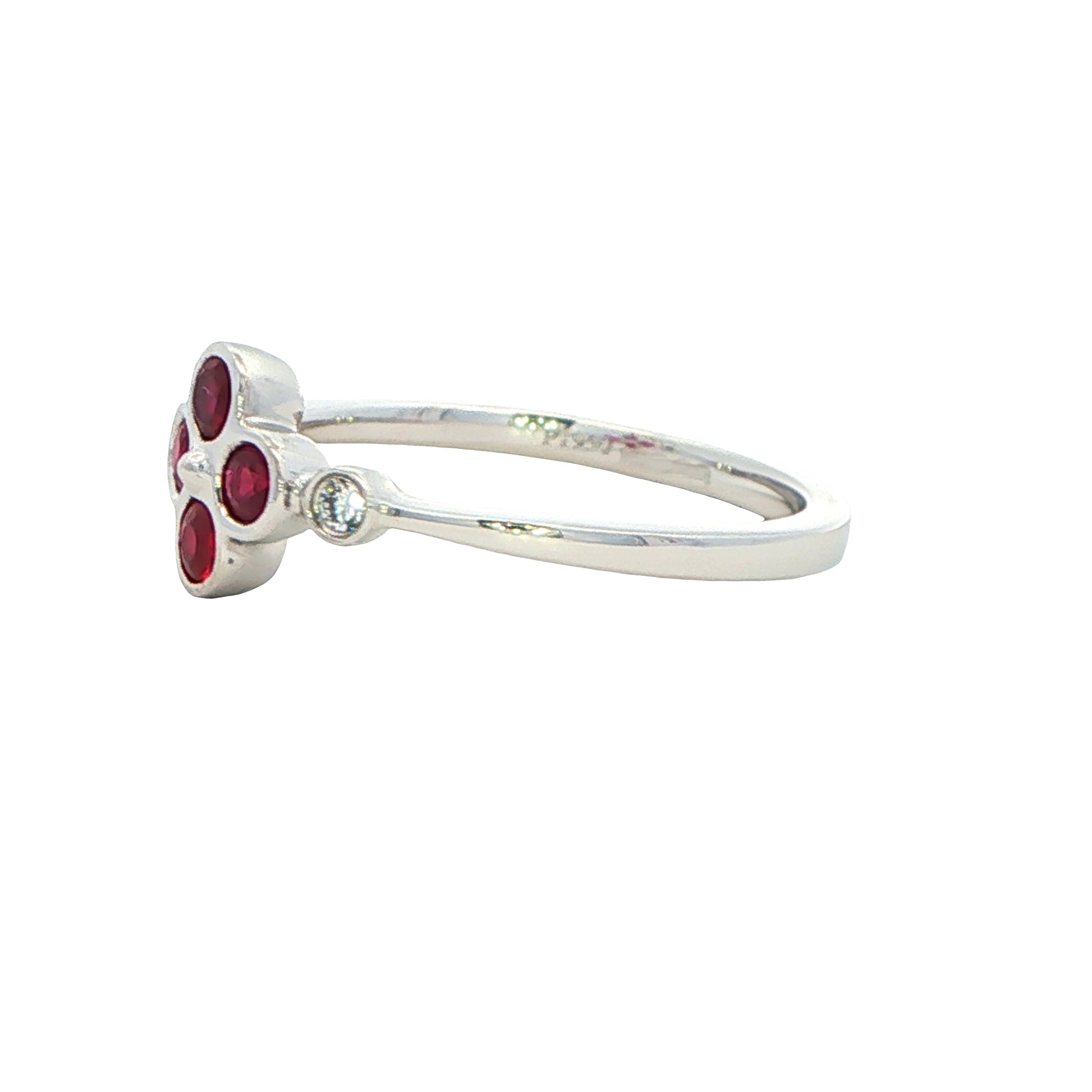 Ruby and round brilliant cut diamond flower style ring Gardiner Brothers