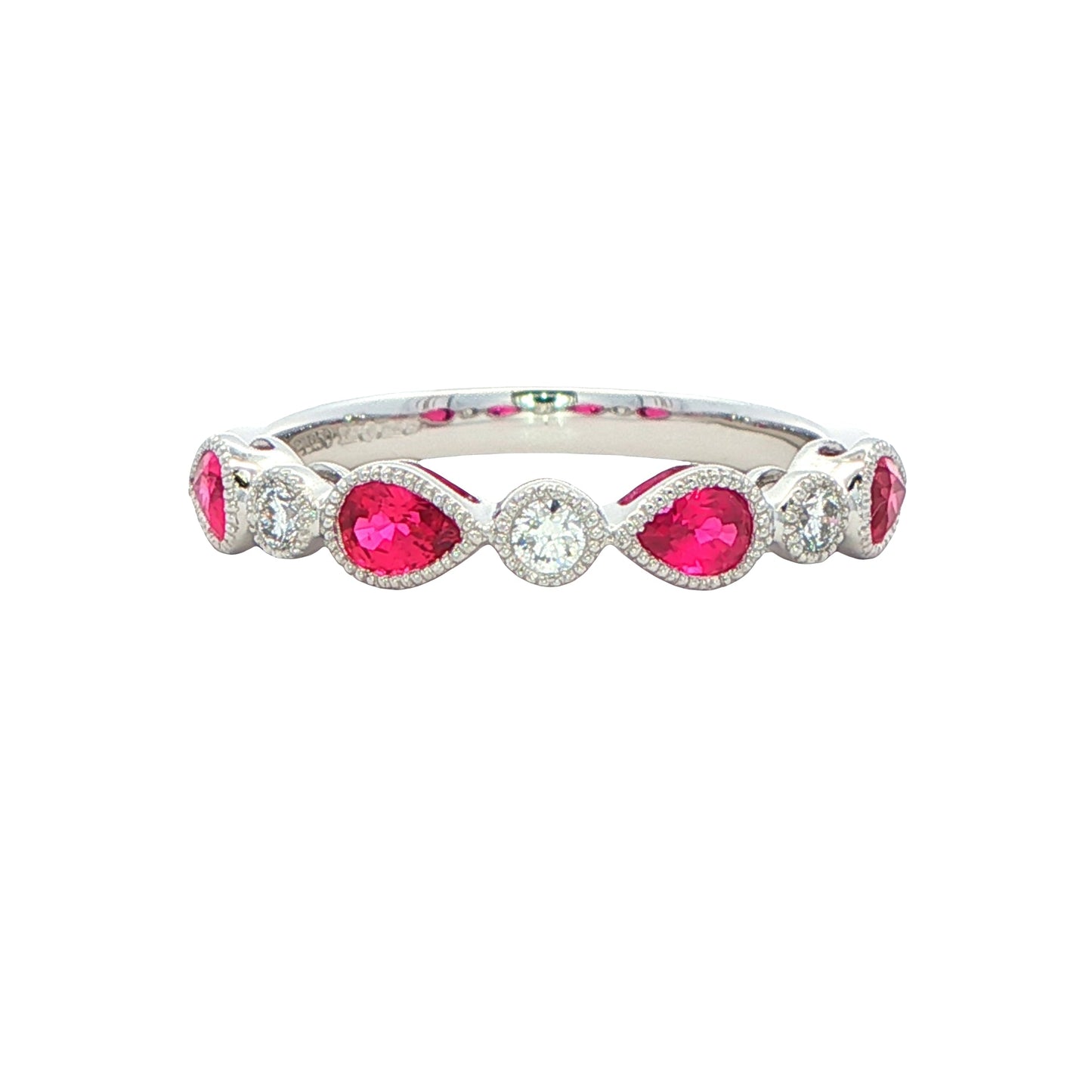 Pear Shaped Ruby and round brilliant cut diamond ring