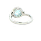 Aquamarine and round brilliant cut diamond halo cluster ring