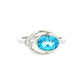 Oval shaped Topaz and round brilliant cut diamond ring Gardiner Brothers
