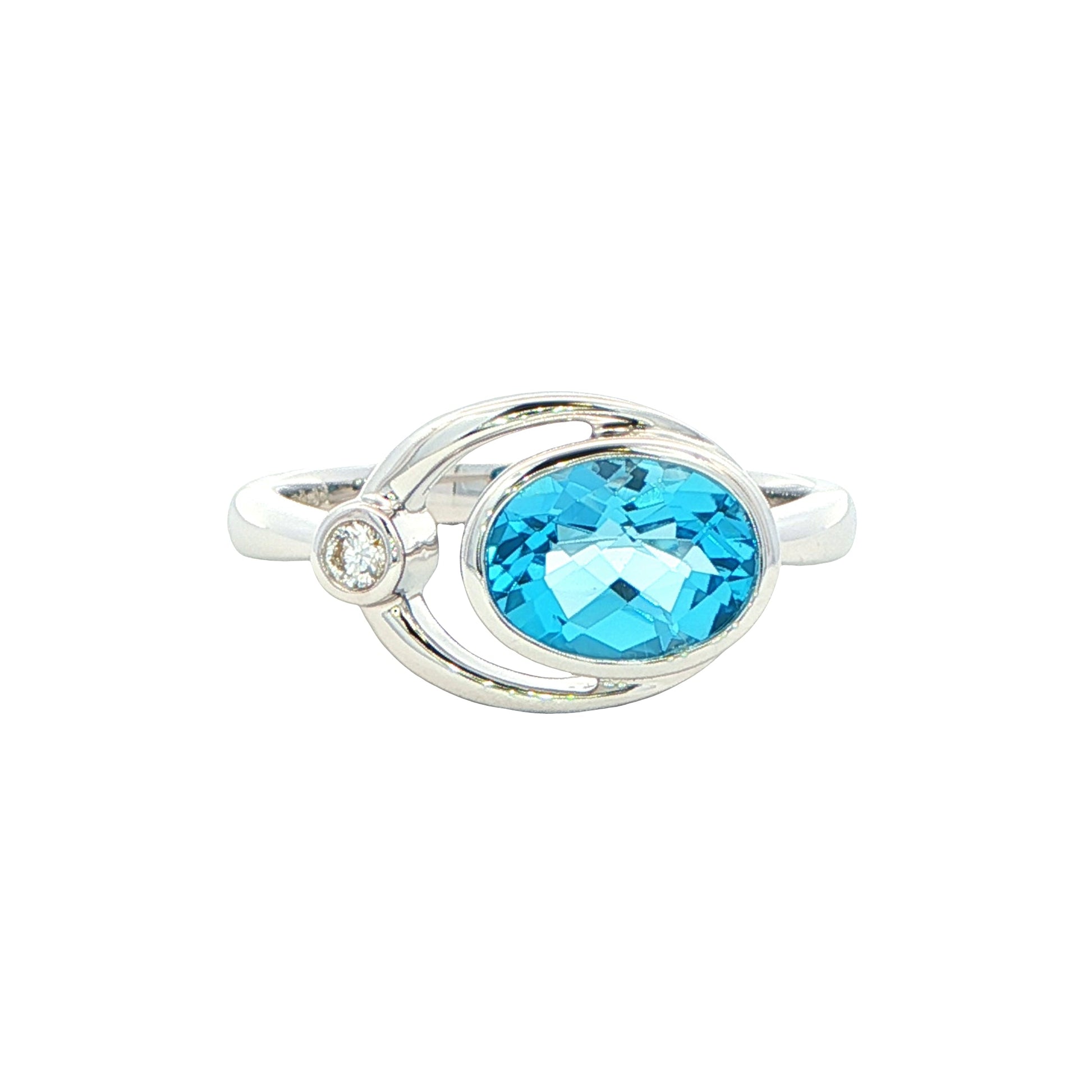 Oval shaped Topaz and round brilliant cut diamond ring Gardiner Brothers