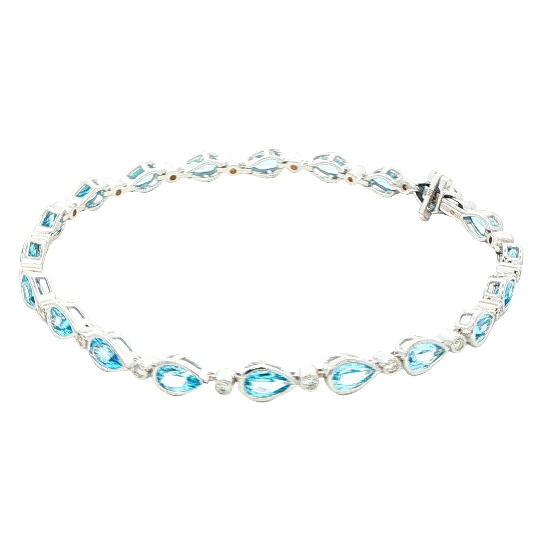 Pear Shaped Topaz and round brilliant cut diamond bracelet Gardiner Brothers