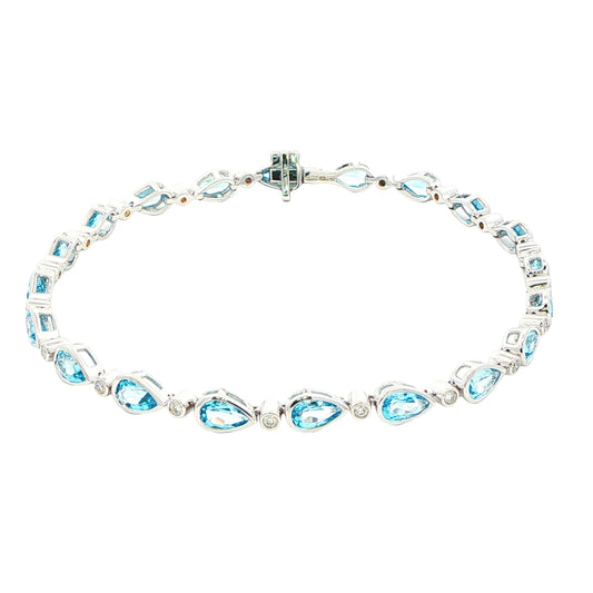 Pear Shaped Topaz and round brilliant cut diamond bracelet Gardiner Brothers