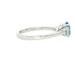 Oval shaped Aquamarine and round brilliant cut diamond 3 stone ring Gardiner Brothers