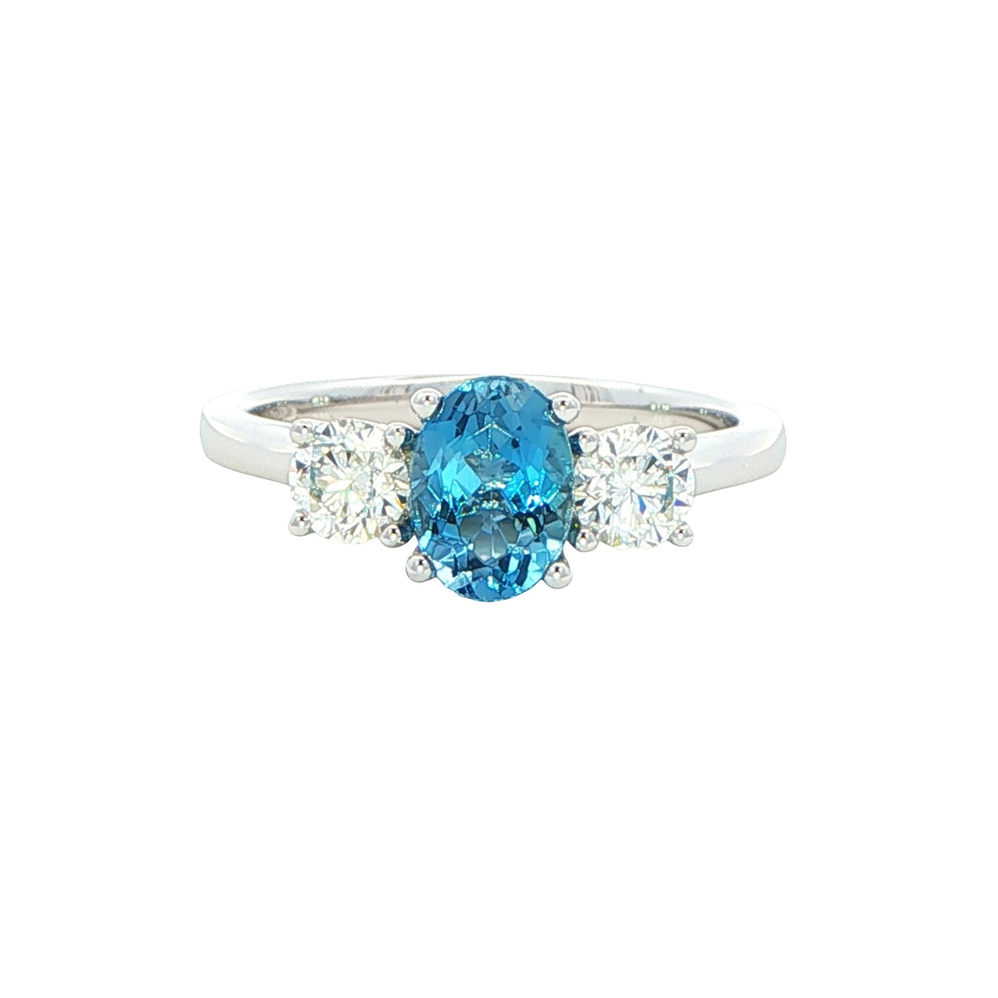Oval shaped Aquamarine and round brilliant cut diamond 3 stone ring Gardiner Brothers