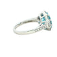 Aquamarine with baguette and round brilliant cut diamonds halo cluster ring Gardiner Brothers